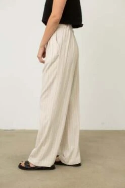 Donni.Pinstripe Pleated Trouser - Cream 13 Donni.Pinstripe Pleated Trouser - Cream -ULLA JOHNSON Clothing Shop Pinstripe Pleated Trouser 20230731215240