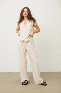 Donni.Pinstripe Pleated Trouser - Cream 15 Donni.Pinstripe Pleated Trouser - Cream -ULLA JOHNSON Clothing Shop Pinstripe Pleated Trouser 20230731215243