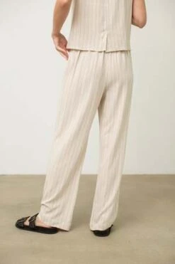 Donni.Pinstripe Pleated Trouser - Cream 17 Donni.Pinstripe Pleated Trouser - Cream -ULLA JOHNSON Clothing Shop Pinstripe Pleated Trouser 20230731215245